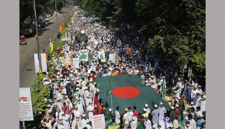 Photograph of a rally brought out in observance of Eid-e-Miladunnabi, the birthday of Prophet Muhammad in Dhaka on Friday. The rally is led by Anjumane Rahmaniya Mainiya Maijbhandariya’s Maolana Saifuddin Ahmed Maijbhandari. — Sourav Lasker