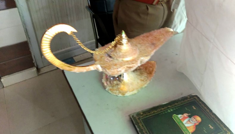 This handout photograph taken on October 29, 2020 and released by the Uttar Pradesh Police shows a lamp which was allegedly sold for $93,000 with the claim that it had magic powers as described in the popular folk tale ‘Aladdin's lamp’, at the Brahampuri police station in New Delhi. — AFP Photo
