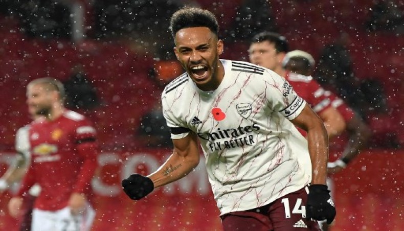 Arsenal's Gabonese striker Pierre-Emerick Aubameyang celebrates after scoring the opening goal from the penalty spot during the English Premier League football match between Manchester United and Arsenal at Old Trafford in Manchester, north west England, on November 1, 2020.- AFP photo