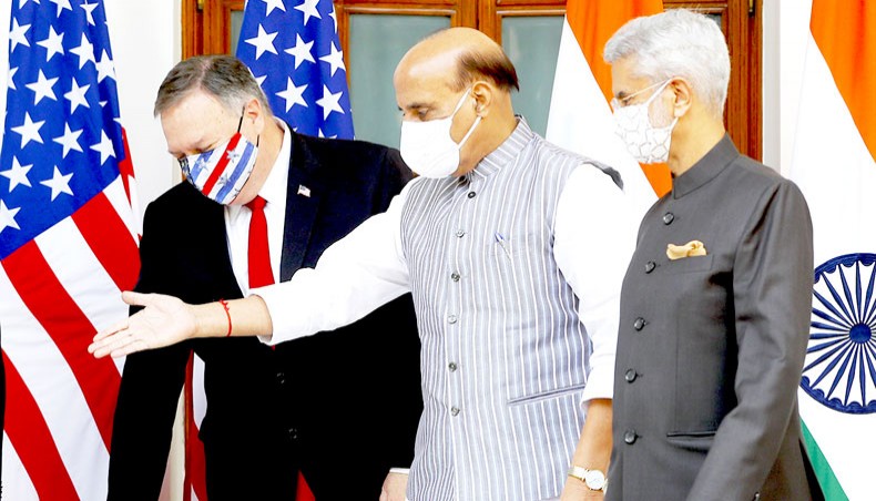 India’s defence minister Rajnath Singh, centre, gestures to US secretary of state Mike Pompeo, left, as India’s foreign minister Subrahmanyam Jaishankar watches before their meeting at Hyderabad House in New Delhi on October 27. — Agence France-Presse/Pool/Adnan Abidi