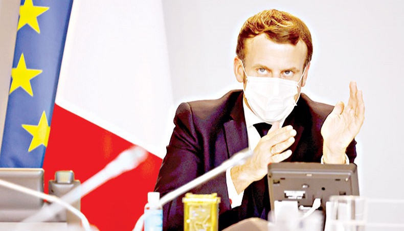 French president Emmanuel Macron chairs a video conference with foreign company executives on November 6 at the Elysee presidential palace in Paris designed to attract more foreign businesses. — Agence France-Presse/Pool/Ludovic Marin