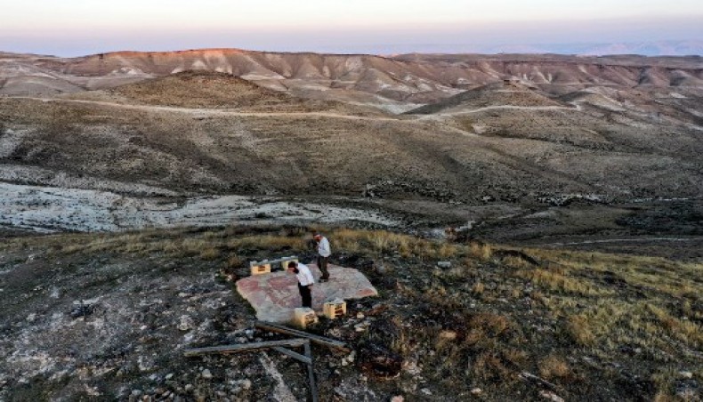 This picture taken on November 17, 2020 shows an aerial view of Orthodox Jewish men performing a noon prayer atop a hilltop near the Israeli settlement of Ma'ale Rehav'am in the occupied West Bank, south of Bethlehem.- AFP photo
