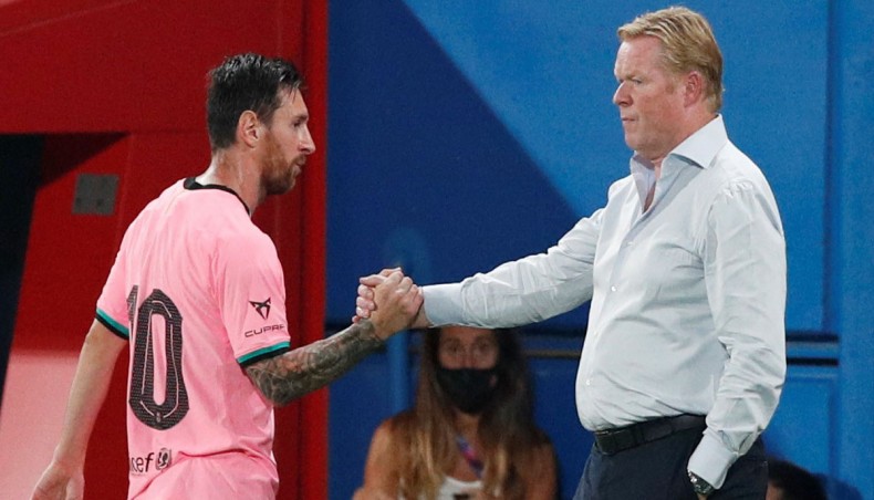 A file photo shows Barcelona manager Ronald Koeman shaking hands with captain Lionel Messi. -- Twitter photo