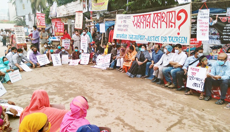 People from different walks of life join a rally in front of the National Press Club in Dhaka on Friday to express solidarity with the victims of Tazreen Fashions fire who were observing a sit-in for proper compensation and rehabilitation. — New Age photo
