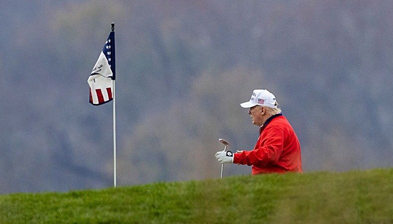 US president Donald Trump golfs at Trump National Golf Club on November 21, 2020 in Sterling, Virginia. — AFP photo