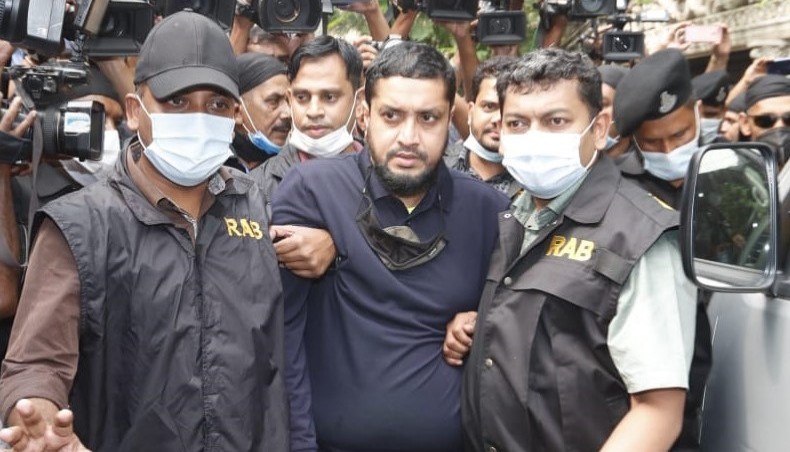 Rapid Action Battalion arrests Monir raiding his Badda residence on Saturday. -- New Age photo