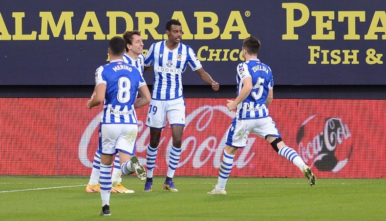 Real Sociedad's Swedish forward Alexander Isak (C) celebrates with team-mates after scoring a goal during their La Liga match against Cadiz at the Ramon de Carranza stadium in Cadiz on Sunday. — AFP photo