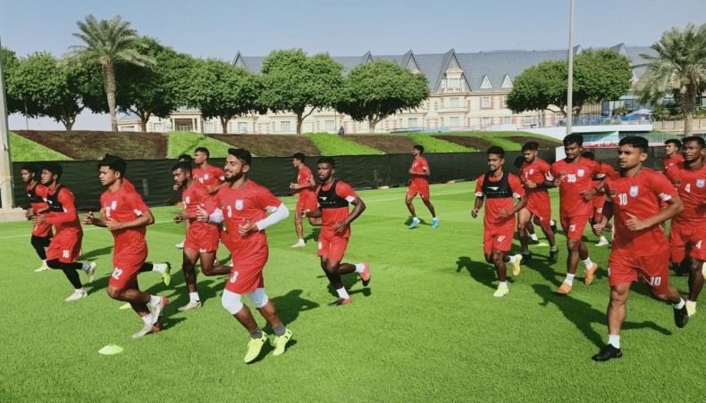 Bangladesh national football team players jog during a training session at the Al Aziziyah Boutique ground in Doha, Qatar on Monday. — BFF photo