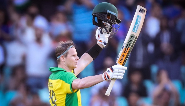Australia’s Steve Smith celebrates his century during their one-day international match against India at the Sydney Cricket Ground on Friday. — AFP photo