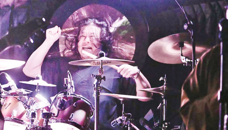 This picture taken on October 18, 2020 shows Jack Tung, drummer and founder of Taiwanese death metal band ‘Dharma’ practising during a rehearsal in Taipei. — AFP photo