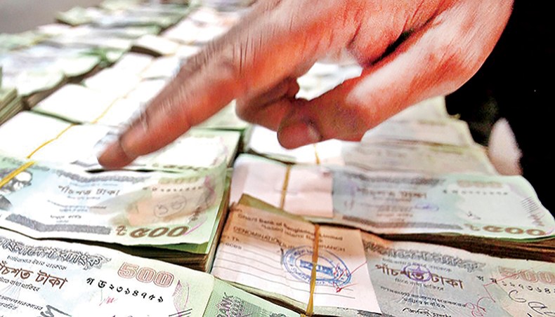 A file photo shows a man counting bundles of taka notes in Dhaka. A total of 3,220 individual taxpayers have so far legalised their undisclosed moveable and immovable properties, including land, building, cash, bank deposits and other financial instruments, under the special scheme offered in the budget for the current fiscal year. — New Age photo