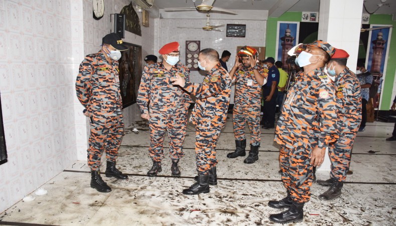 Fire fighters check the Narayanganj mosque on September after explosions. -- New Age photo