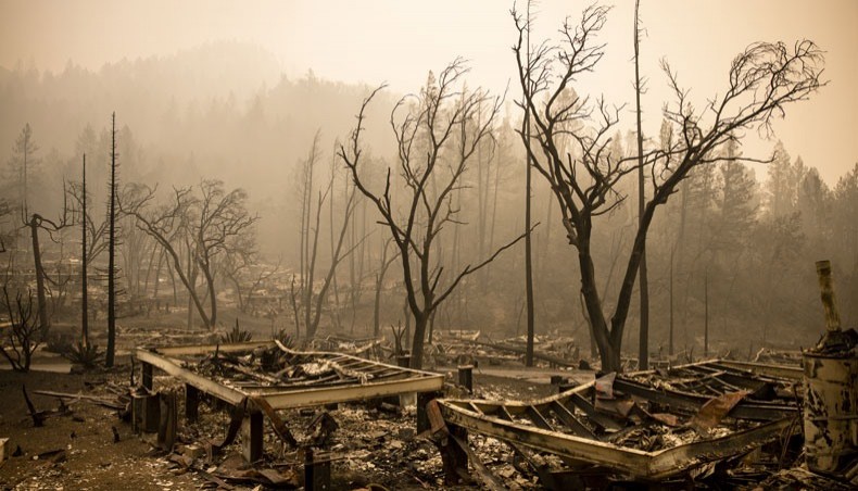 In this file photo taken on September 30, 2020 The remains of the guest houses at Calistoga Ranch smoulder after the Glass Fire passed through in, Calistoga, Napa Valley, California on September 30, 2020. -- AFP photo