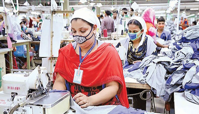 A file photo shows workers sewing clothes at a readymade garment factory on the outskirts of Dhaka. The country’s export earnings grew by 0.76 per cent to $3.07 billion in November 2020 from $3.05 billion in the same month of 2019.— New Age photo
