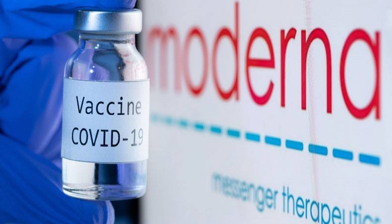 In this file photo taken on November 18, 2020 shows a bottle reading 'Vaccine COVID-19' next to the Moderna biotech company logo. -- AFP photo