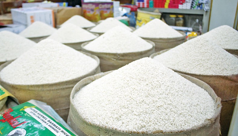 A photo shows sacks of rice at a shop at the Kaptan Bazar kitchen market in the capital on Friday. The prices of rice and edible oil increased further on the city’s kitchen markets over the week ending on Friday. — Focusbangla photo
