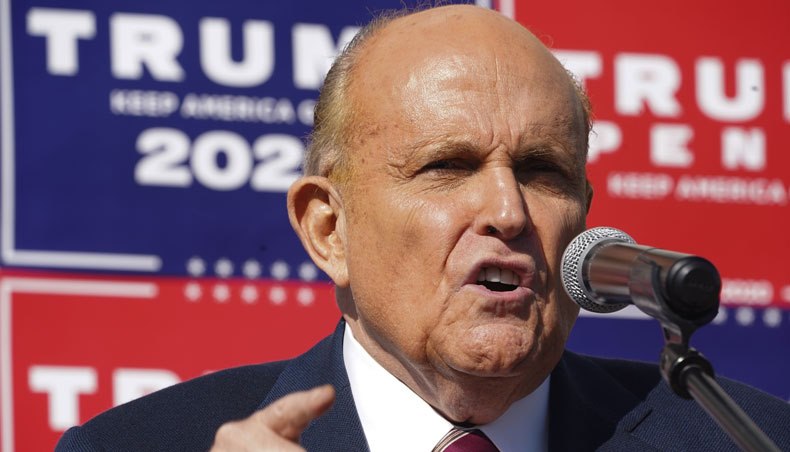 In this file photo taken on November 7, 2020 attorney for president Donald Trump, Rudy Giuliani, speaks at a news conference in the parking lot of a landscaping company in Philadelphia. — AFP photo