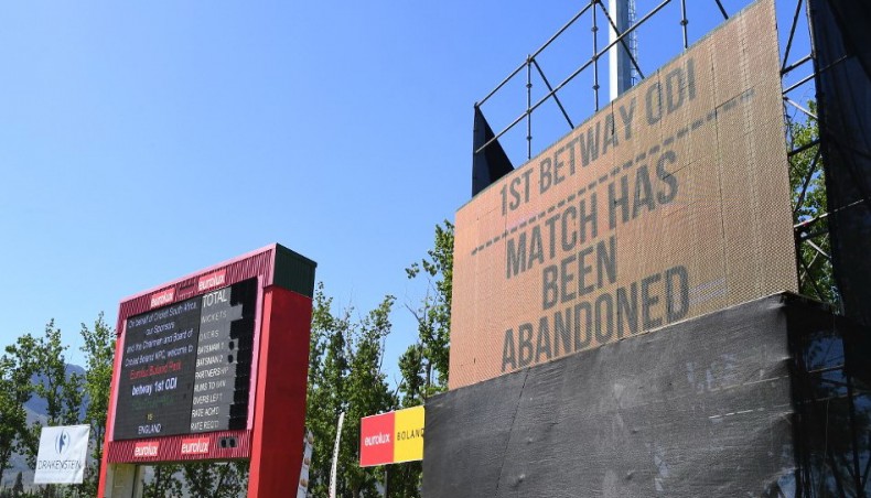 A general view of a screen announcing that the first one-day international match between South Africa and England has been abandoned at Boland Park stadium in Paarl on Saturday. — AFP photo