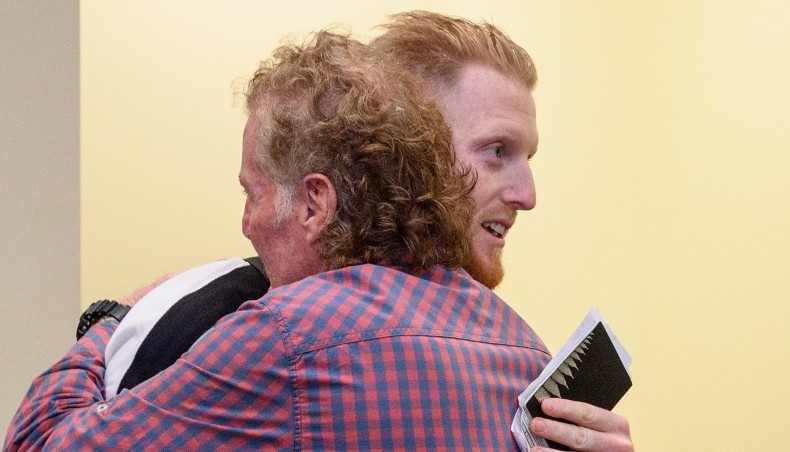 A file photo shows England all-rounder Ben Stokes embracing his father Ged Stokes. — Twitter photo