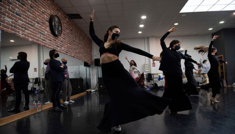 Spanish flamenco dancer Joaquin Cortes, left, looks at dancers during the rehearsal of his show ‘Esencia’ in Madrid on December 10, 2020. — AFP Photo