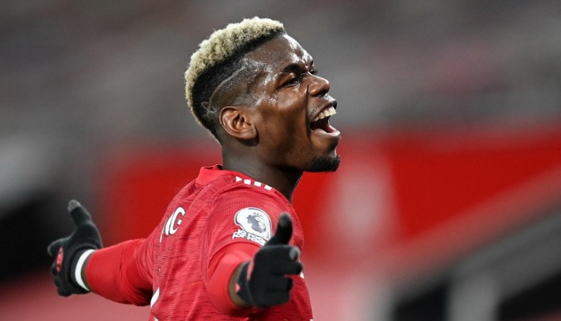 Manchester United midfielder Paul Poga gestures during their Premier League match against Manchester City at Old Trafford on Saturday. — AFP photo
