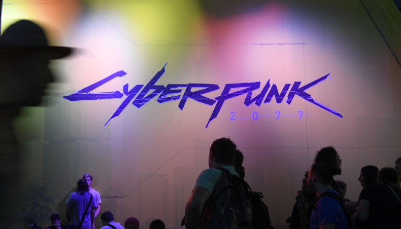 In this file photo taken on August 21, 2019 visitors wait at the Cyberpunk 2077 stand during the video games trade fair Gamescom in Cologne, western Germany. — AFP Photo