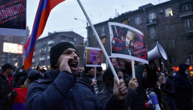 Protesters march through the streets of Yerevan to demand the resignation of prime minister Nikol Pashinyan over a controversial peace agreement with Azerbaijan that ended six weeks of war over the disputed region of Nagorno-Karabakh, on December 14, 2020. -- AFP photo