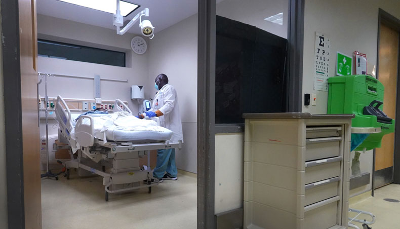 A patient receives treatment in the emergency room at Roseland Community Hospital on December 15, 2020 in Chicago, Illinois. — AFP photo
