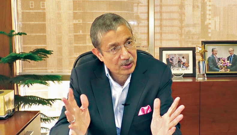 Dhaka Bank managing director and chief executive officer Emranul Huq speaks in an interview with New Age on December 13. — New Age photo
