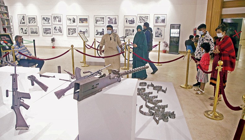 People look at firearms used by freedom fighters and allied forces during the War of Independence at an exhibition under way at Nalinikanta Bhattasali Gallery of the Bangladesh National Museum. — Sony Ramany