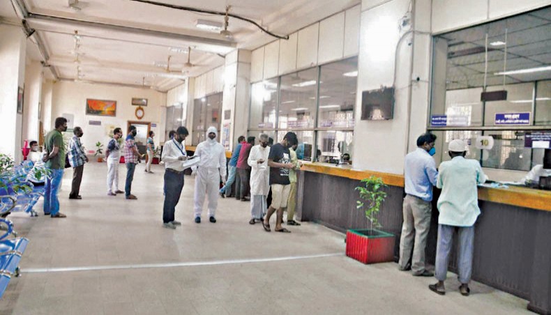 A file photo shows clients receiving services at a branch of a state-owned bank in the capital. One-third of the country’s banks are holding three-fourths of the deposits in the country’s banking sector, according to Bangladesh Bank data. — New Age photo