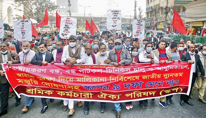Sramik Karmachari Oikya Parishad, a combine of 12 labour rights bodies, stages a protest rally to press home its nine-point demand in Dhaka on Saturday. — New Age photo