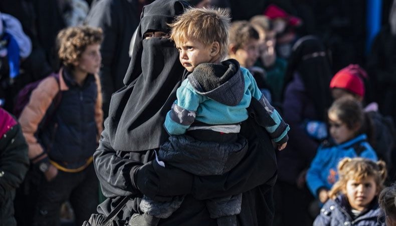 Syrians wait to leave the Kurdish-run al-Hol camp which holds relatives of alleged Islamic State group fighters, in the Syrian northeastern al-Hasakeh governorate on December 10, 2020. -- AFP photo