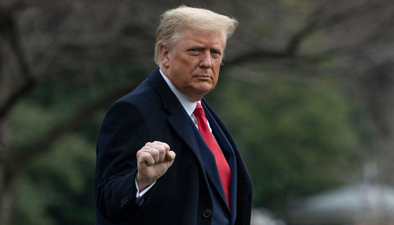 In this file photo US president Donald Trump departs the White House in Washington, DC, on December 12, 2020. — AFP photo