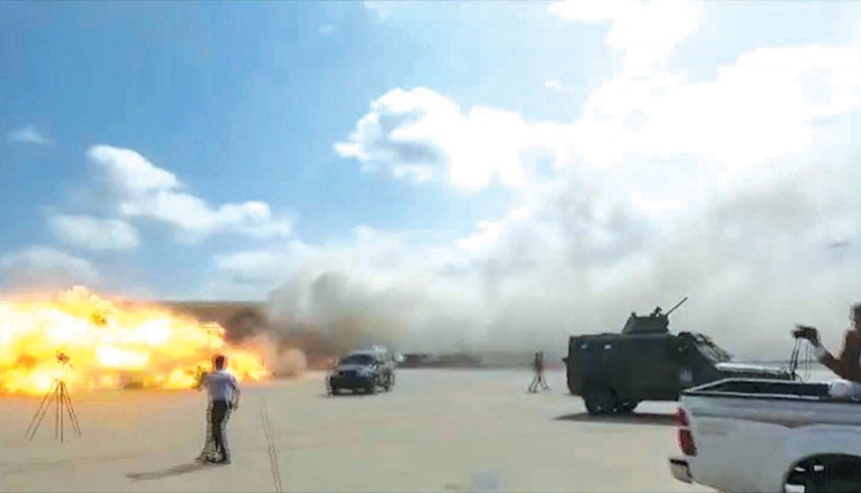 A video grab shows the moment an ordnance hit the airport in the southern Yemeni port city of Aden on Wednesday, shortly after the arrival of a plane carrying members of a new unity government. Explosions rocked Yemen’s Aden airport shortly after the arrival of a plane carrying members of a new unity government, an AFP correspondent at the scene said. — AFP photo