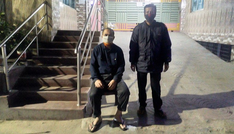 Two nightguards during duty. -- Sony Ramany