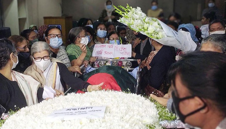 Mourners place wreaths at the coffin of Bangladesh Mahila Parishad president Ayesha Khanam at the Parishad office at Segunbagicha in Dhaka on Saturday. — New Age photo