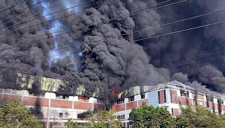 Huge plumes of smoke billow from the Konka electronic products factory at Sonargaon in Narayanganj after a fire engulfed the building on Sunday morning. — New Age photo