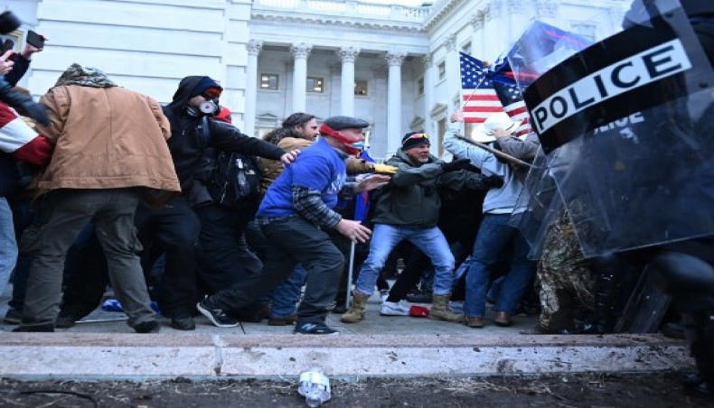 Trump supporters clash with police and security forces, as they storm the US Capitol in Washington, DC, on January 6, 2021.- AFP photo