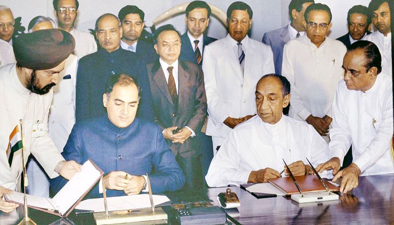 India’s pime minister Rajiv Gandhi and Sri Lanka’s president JR Jayewardene sign the Indo-Sri Lanka accord in Colombo on July 29, 1987. — The Hindu