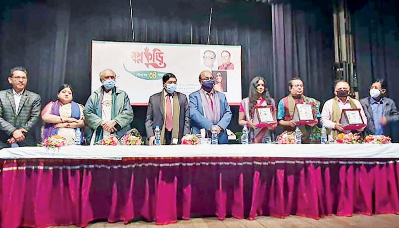 Guests, organisers and awardees pose for a photo at the 34th founding anniversary celebration programme of cultural organisation Swapnakuri at the Music and Dance Centre Bangladesh Shilpaka Academy on Friday. — press release