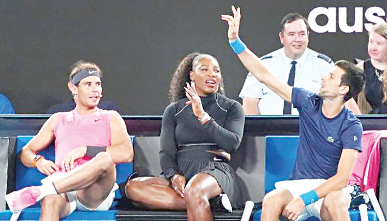 A file photo shows Rafael Nadal, Serena Williams and Novak Djokovic participating in the Rally For Relief at Rod Laver Arena in Melbourne.— AFP photo