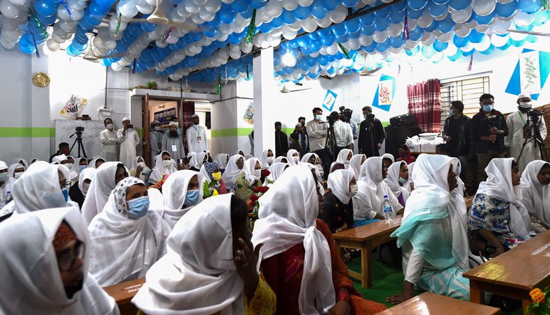 Members of the transgender community gather to learn the Holy Quran in a madrassah — Islamic school — for transgender Muslims, in Dhaka on January 8, 2021. — AFP photo