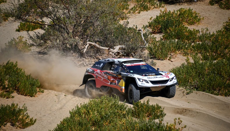 Peugeot’s French driver Cyril Desprez and his co-driver, South African-Swiss explorer and adventurer Mike Horn, compete during Stage 1 of the 2021 Dakar Rally between Jeddah and Bisha in Saudi Arabia, on January 3, 2021. — AFP photo