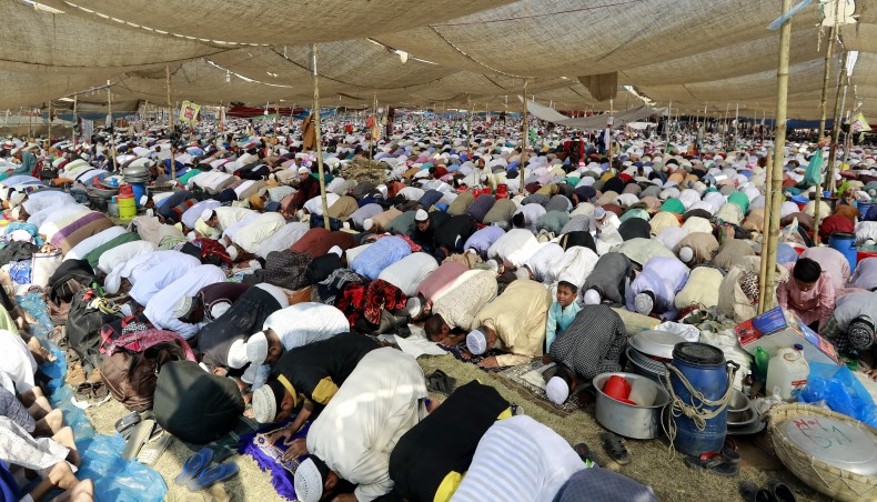 Devotees say jumma prayers on the road being spilled out of the Bishwa Ijtema venue at Tongi, on the outskirts of Dhaka, on the first day of second phase of Ijtema 2018, on January 17, 2019. — New Age file photo