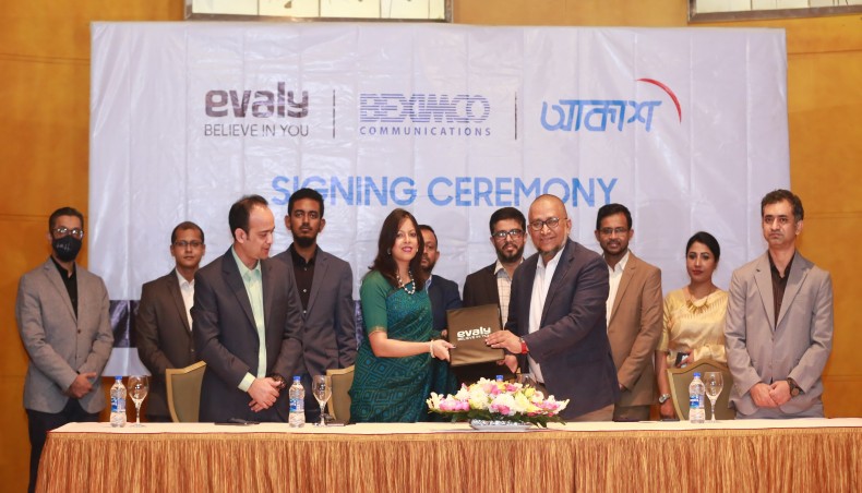 Beximco Communications Ltd chief executive officer DS Faisal Hyder and Evaly chairman Shamima Nasrin exchange documents after signing an agreement at a city hotel on Tuesday. — Press release