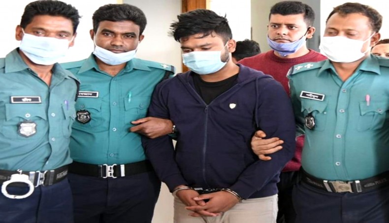 A file photo shows police taking Fardin Iftekhar Dihan to court,