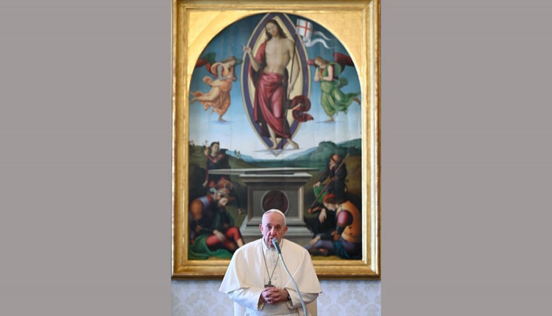 This photo taken on January 13, 2021 shows Pope Francis holding a live streamed weekly private audience in the library of the apostolic palace in The Vatican. — AFP Photo