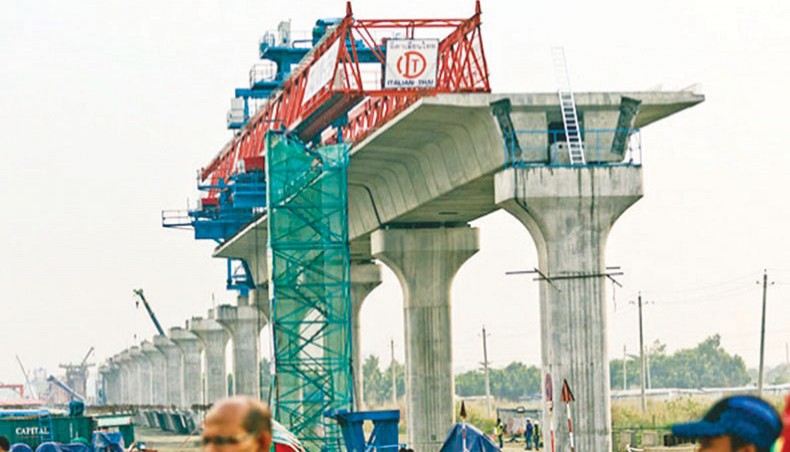 A file photo shows pillars and a span of under construction infrastructure of metro rail. Implementation of the annual development programme hit a 10-year low to 23.89 per cent in the first half (July-December) of the current fiscal year 2020-2021 due to a slow progress in development activities amid the COVID-19 outbreak-induced economic slowdown. — New Age photo