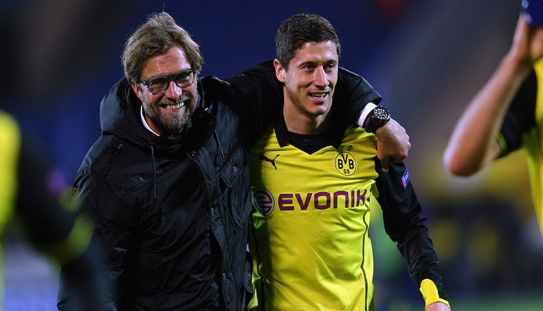 A file photo shows former Borussia Dortmund striker Robert Lewandowski (R) celebrating with coach Jurgen Klopp.-- Twitter photo